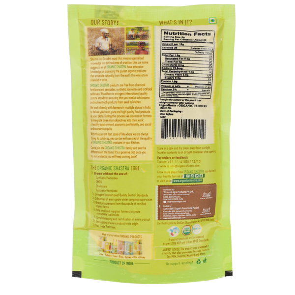 Back view of Organic Shastra Turmeric Powder 100 gm packaging showing product information and nutritional facts